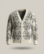 Gilet Triko Paisley – Blanc – front – V-neck knit cardigan with front button closure, black paisley motif throughout, ribbed V-neckline bo