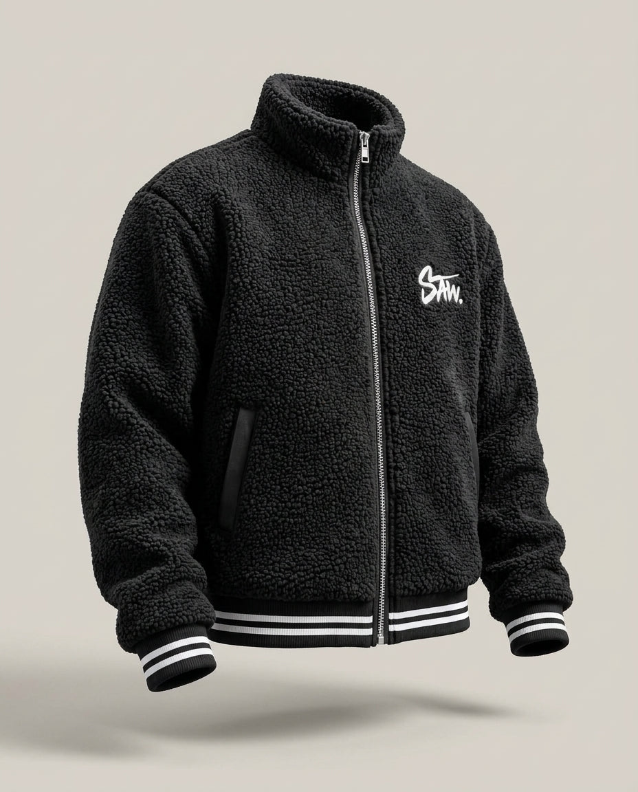 Gilet SAW – Noir – side – Black sherpa jacket, closed front zip, high stand collar, chest embroidery