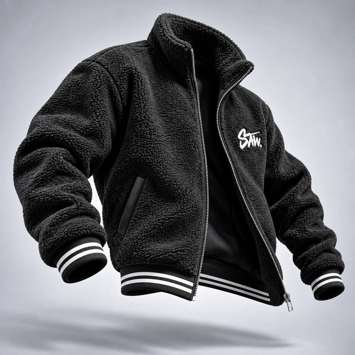 Gilet SAW – Noir – side – Black fleece jacket, open front zipper, white chest logo, striped ribbed cuffs