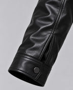 Street Style Leather Jacket – Noir – detail – close-up of sleeve cuff with snap button and placket detail