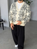 Gilet Triko Paisley – Beige – worn – full front view of model wearing beige paisley knit cardigan sweater