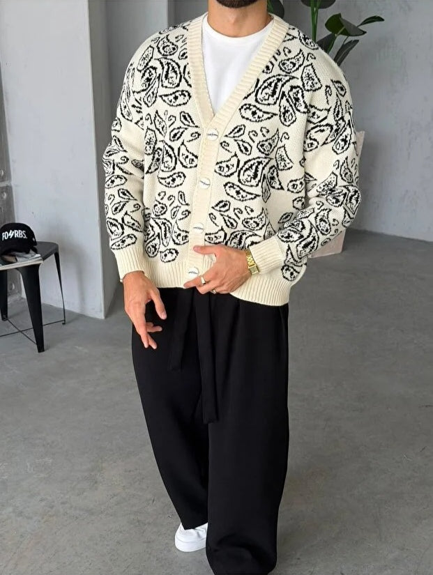Gilet Triko Paisley – Beige – worn – full front view of model wearing beige paisley knit cardigan sweater