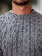 Tricot Maille Torsadée – Gris – detail – close-up of ribbed crew neck collar and cable knit pattern