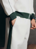 Tracksuit Set – Ivory – Blanc – detail – side pocket view with dark green side stripe and ribbed cuffs
