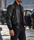 Veste Urban Black Rider – Noir – side – Side view of black leather bomber jacket with zipped pocket detail