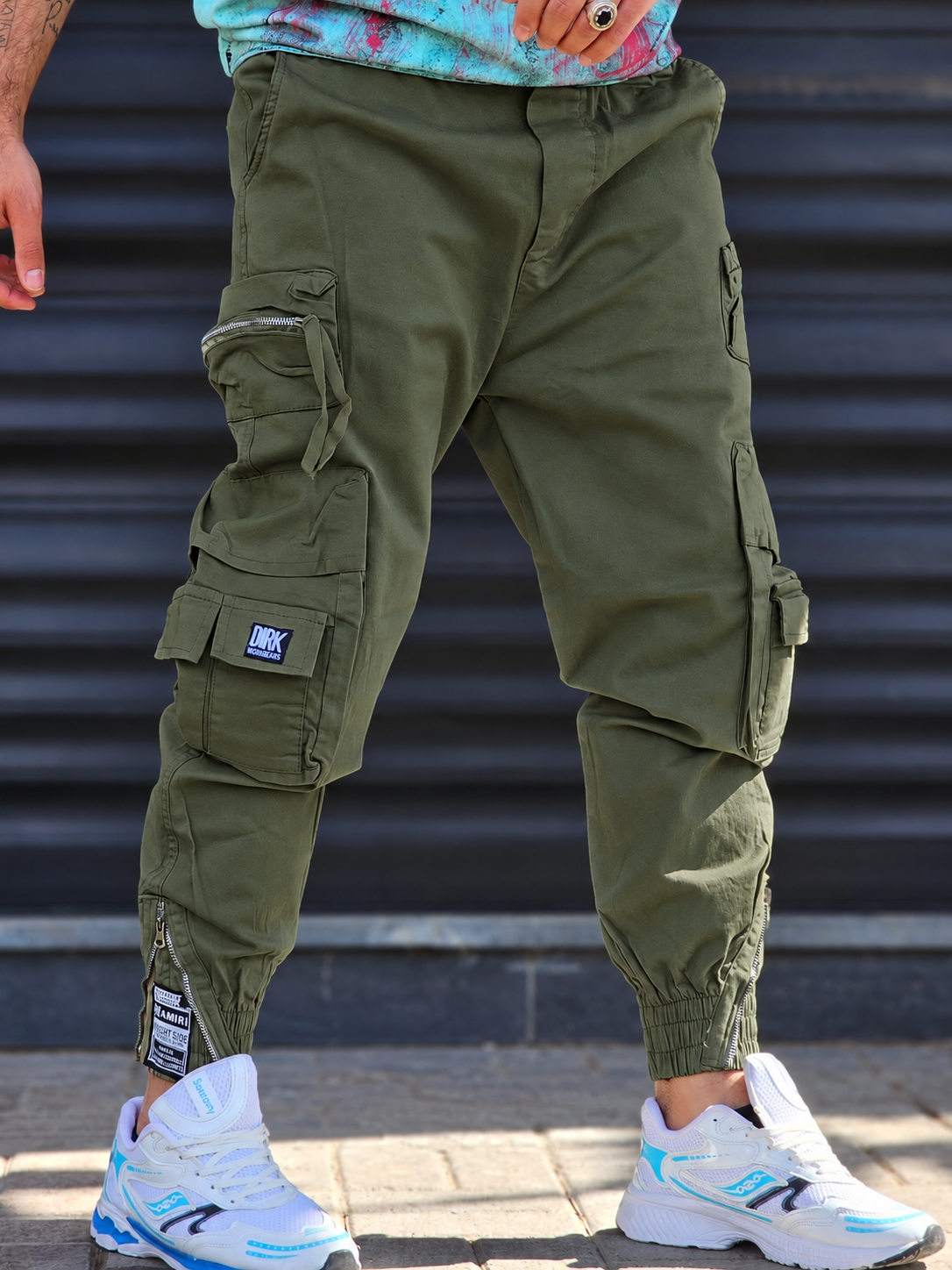 Jogger Pant Vibe – Green – worn – olive green cargo jogger pants with front and side flap pockets